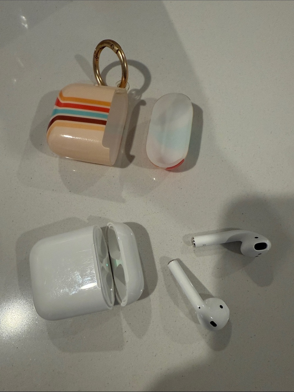 Apple White AirPods with Colorful Retro Stripe Case